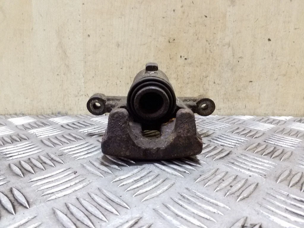 Rear brake caliper – right