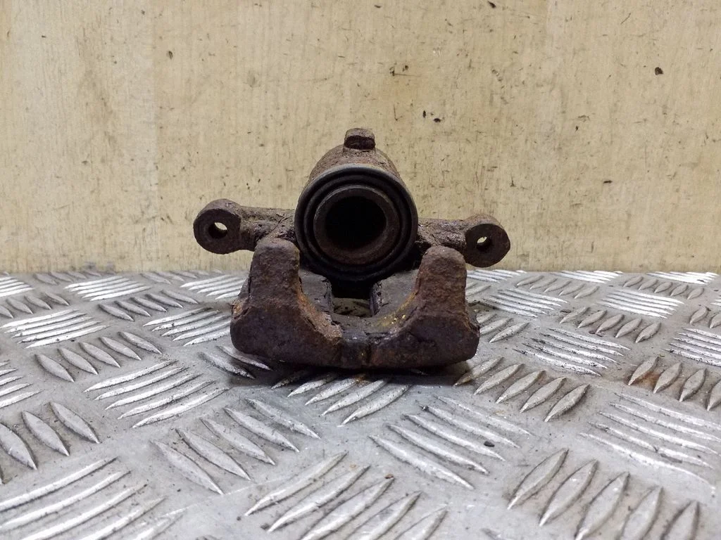 Rear brake caliper – right