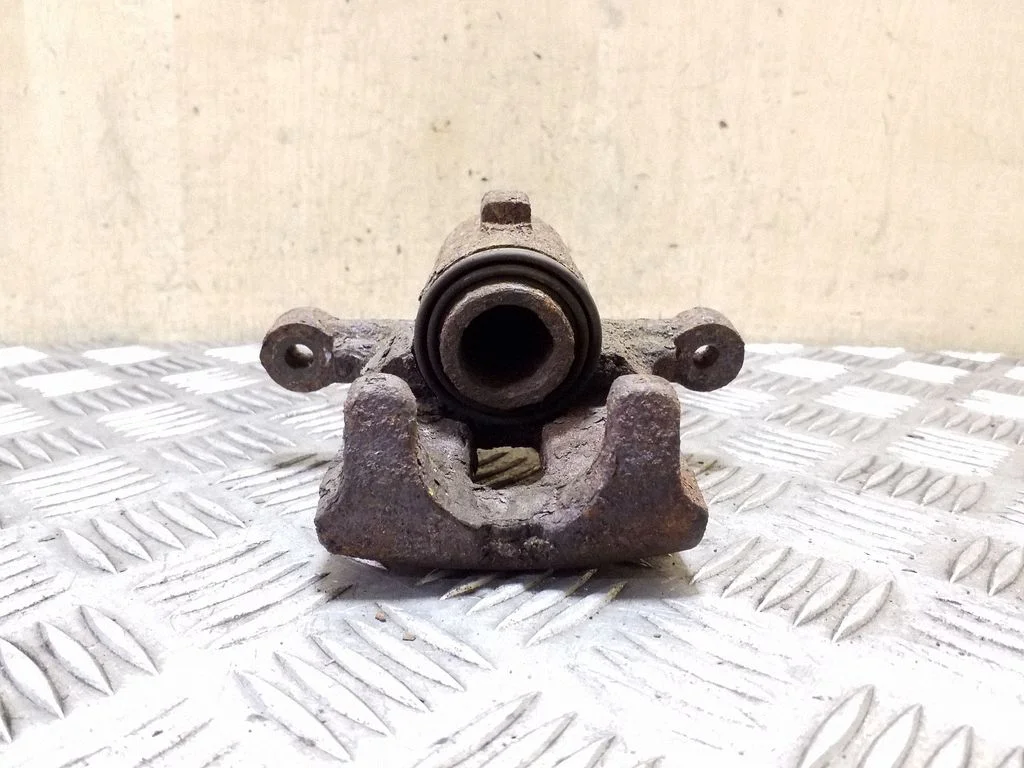 Rear brake caliper – right