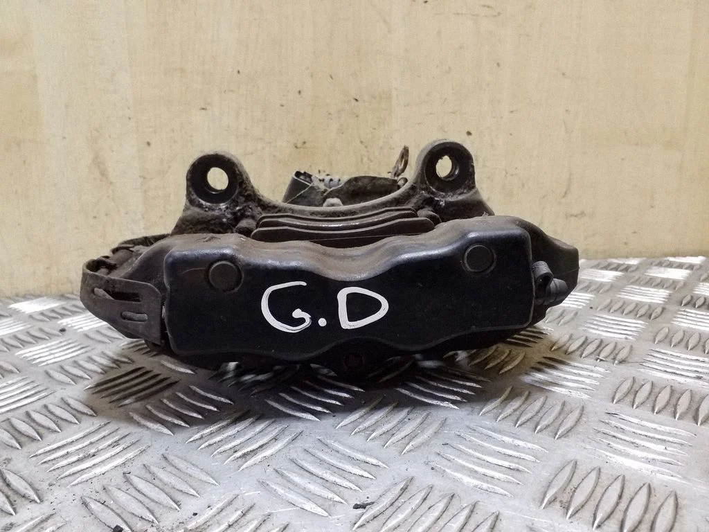 Rear brake caliper – right