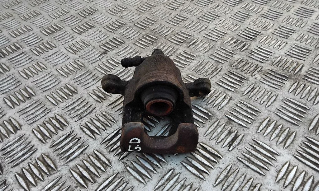 Rear brake caliper – right
