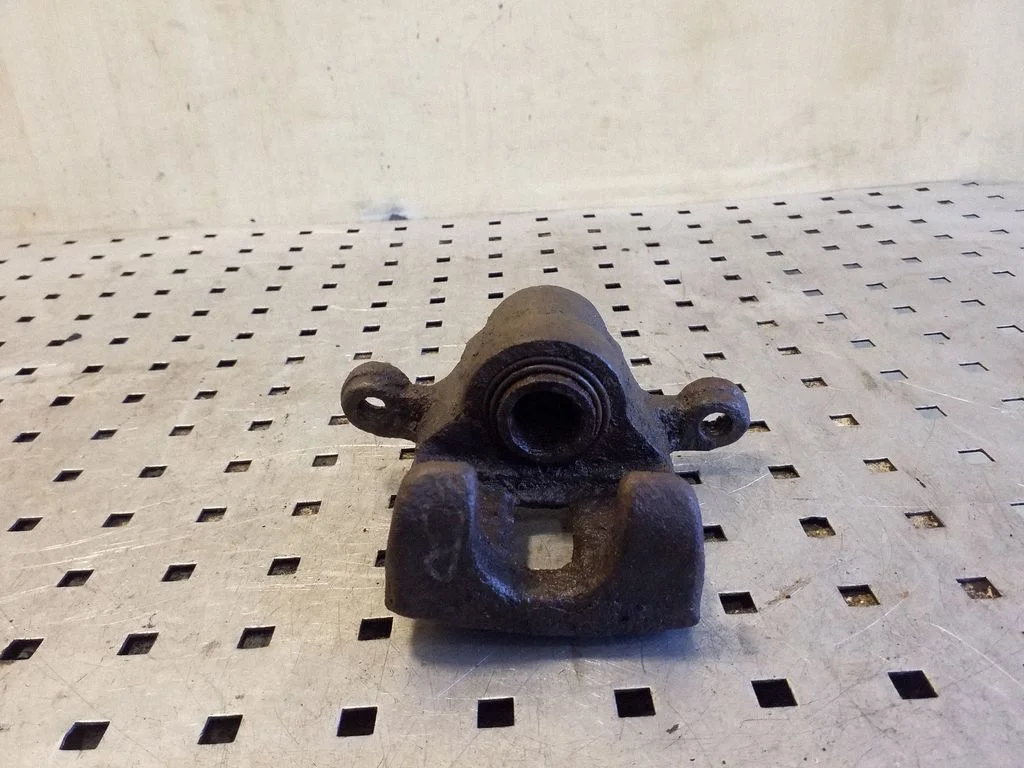 Rear brake caliper – right