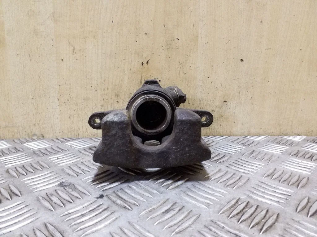 Rear brake caliper – right
