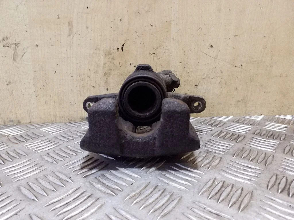 Rear brake caliper – right