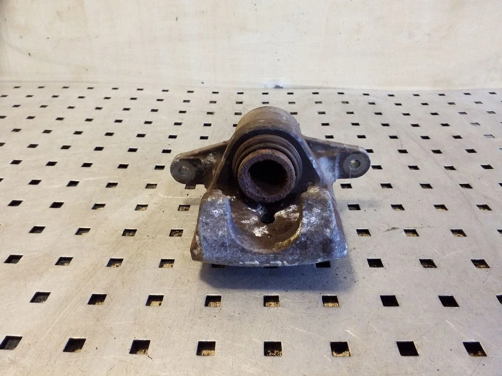 Rear brake caliper – left