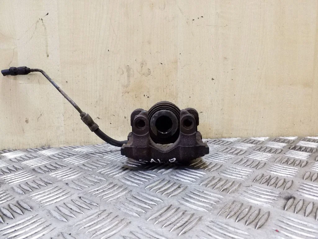 Rear brake caliper – right