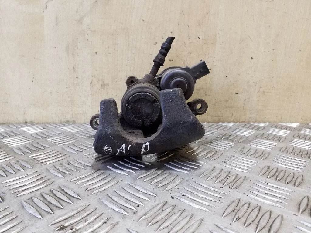 Rear brake caliper – right