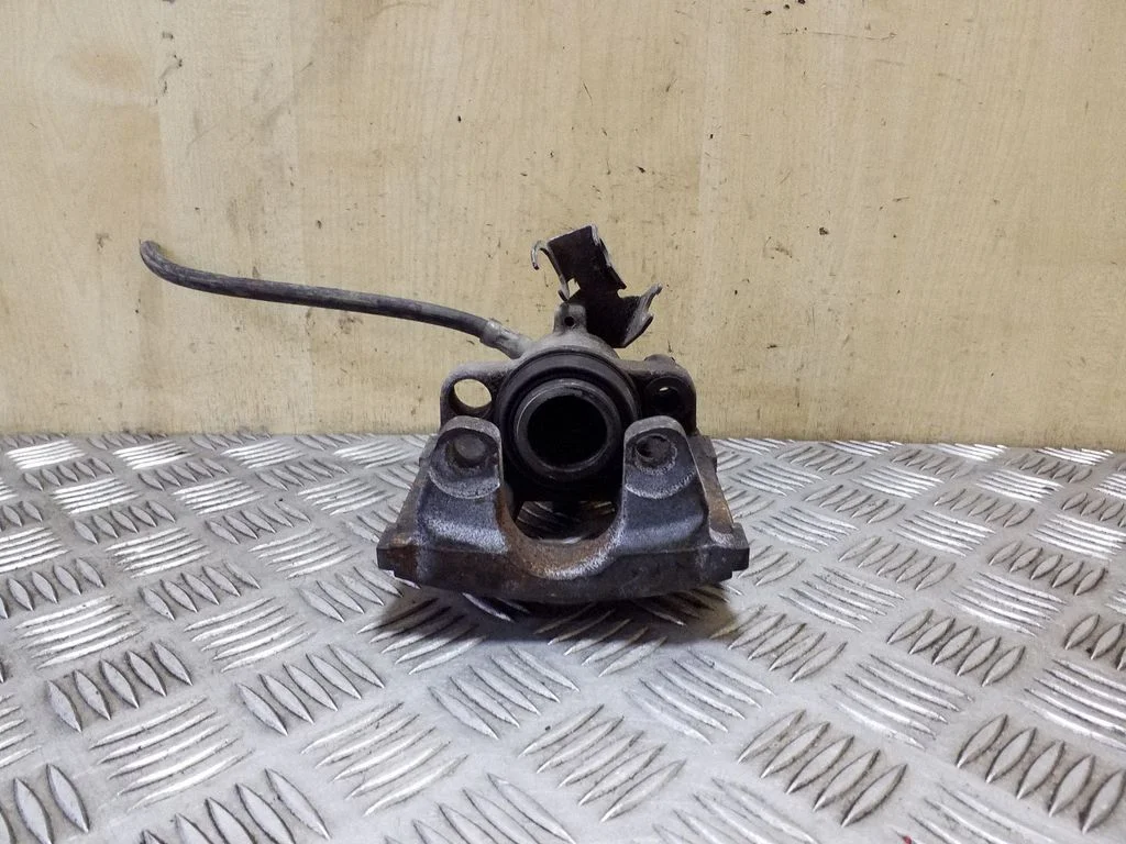 Rear brake caliper 7L6967