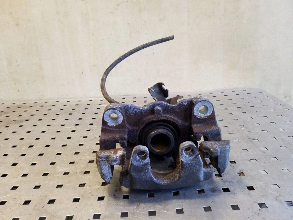 Rear brake caliper – right