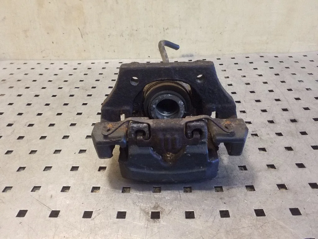 Rear brake caliper – right