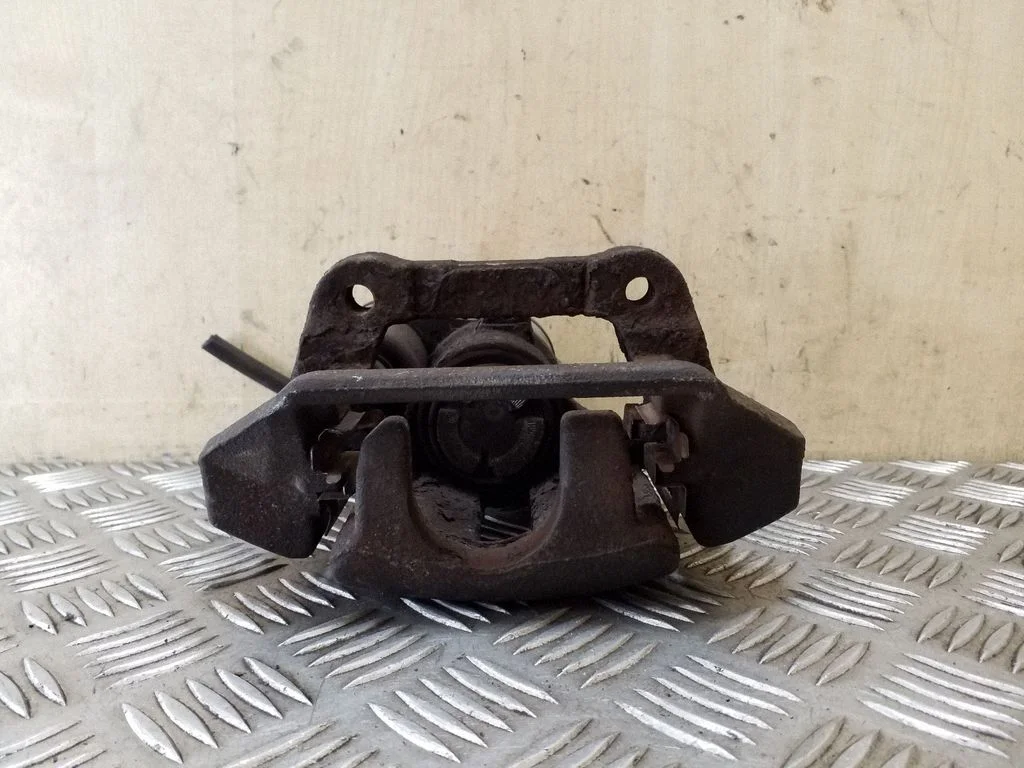 Rear brake caliper 32332594