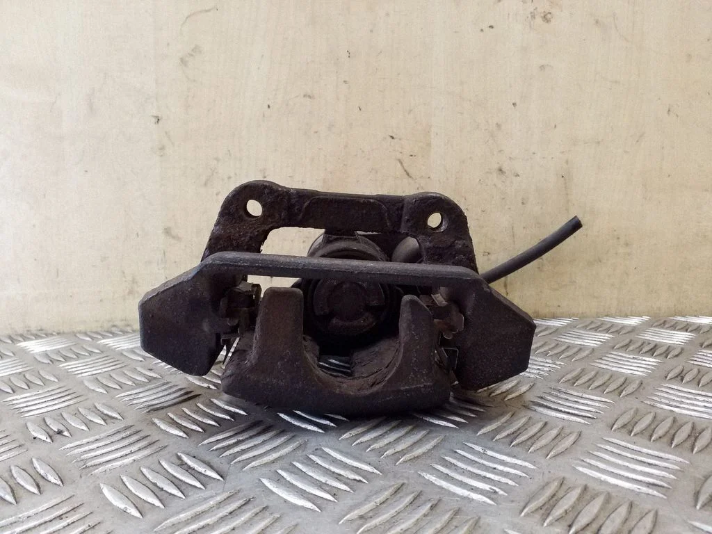 Rear brake caliper 32332594