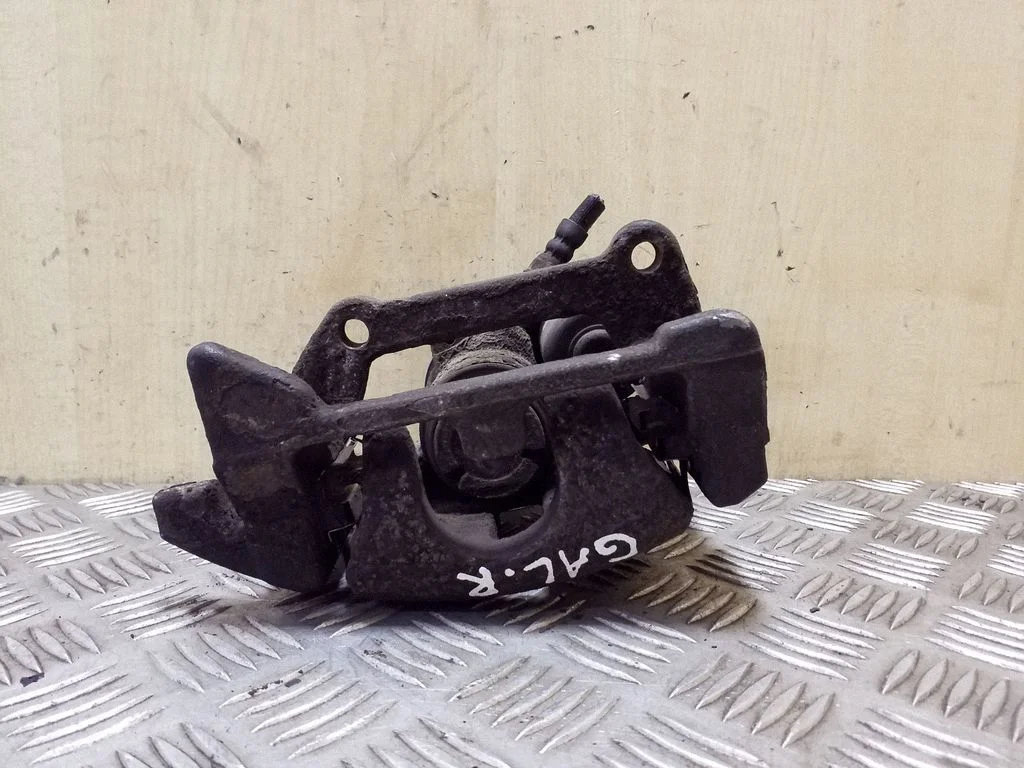 Rear brake caliper – right