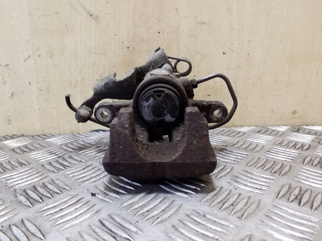 Rear brake caliper – right