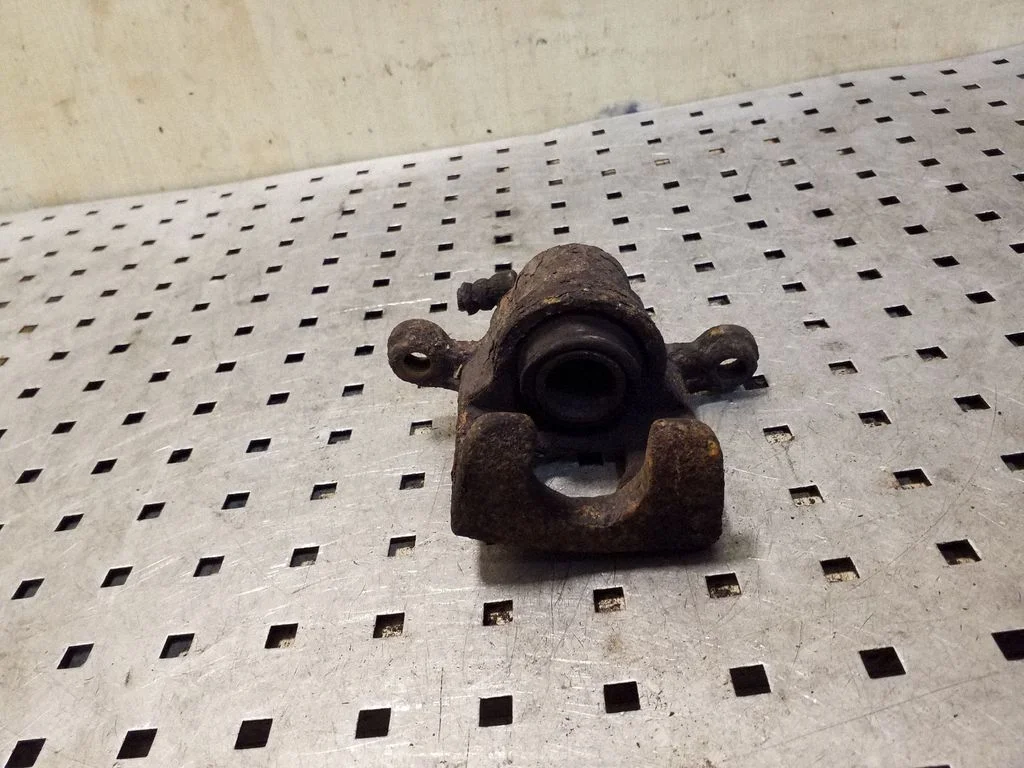 Rear brake caliper – right