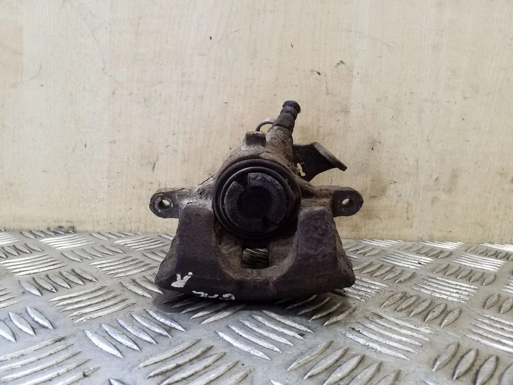 Rear brake caliper – right