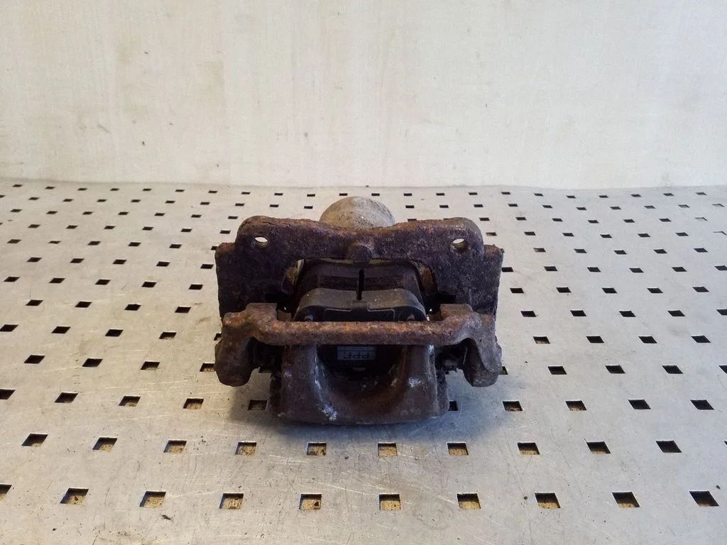 Rear brake caliper – right