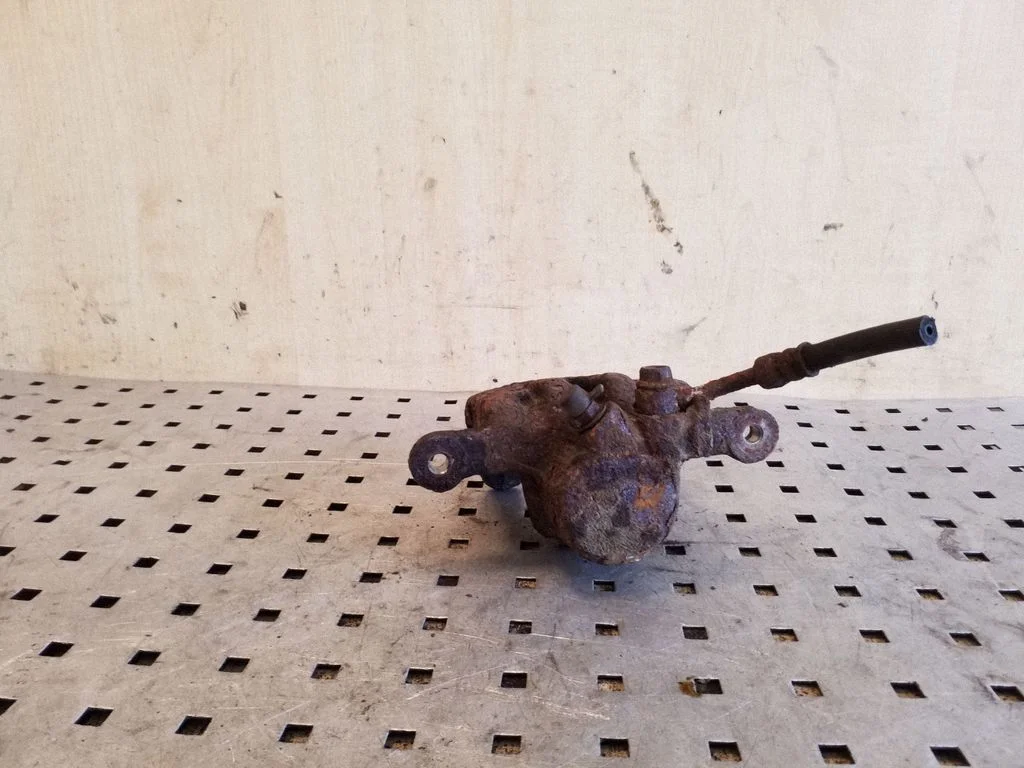 Rear brake caliper – rear left