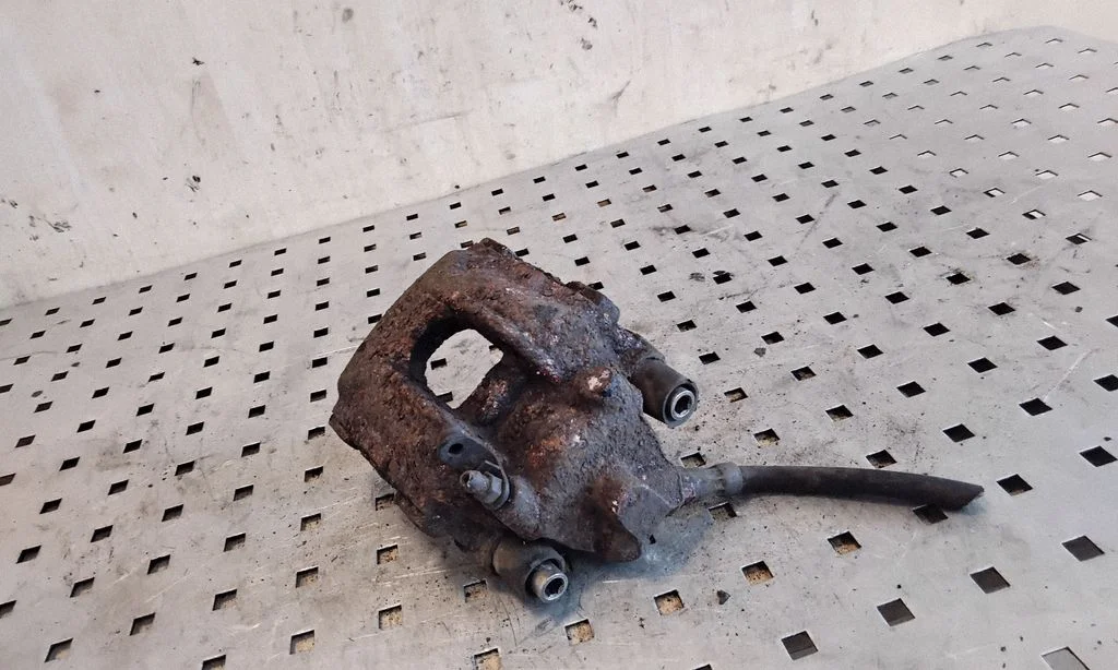 Rear brake caliper – right