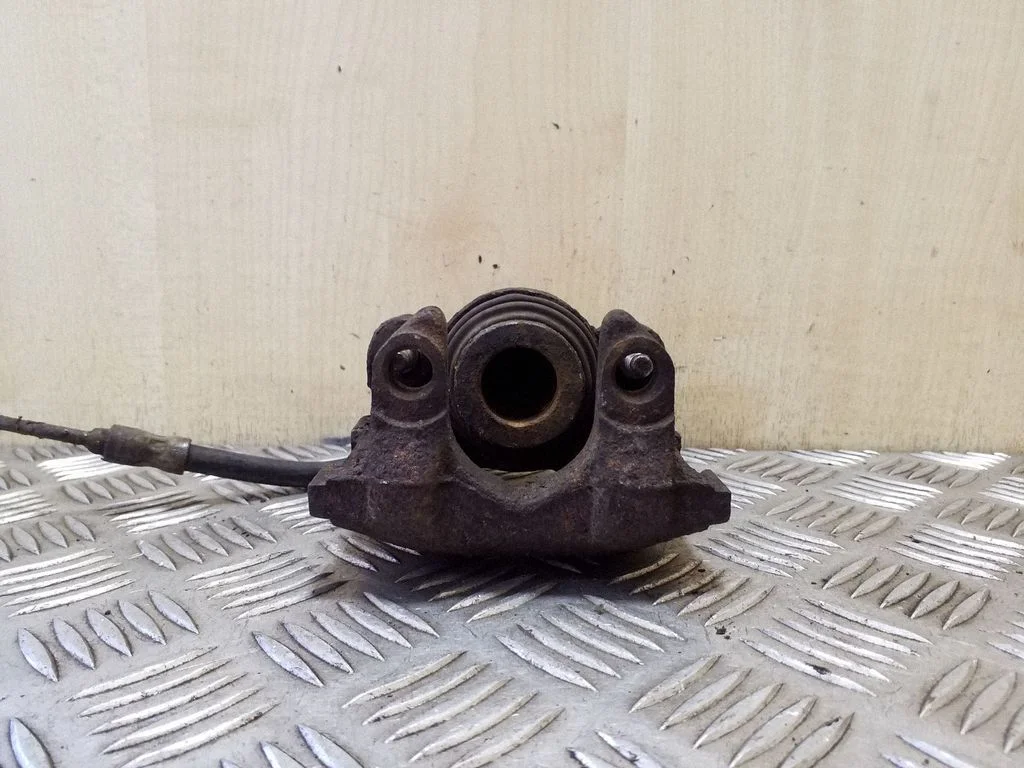 Rear brake caliper – right