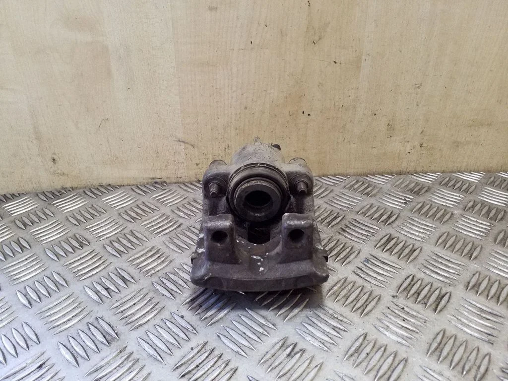 Rear brake caliper – right