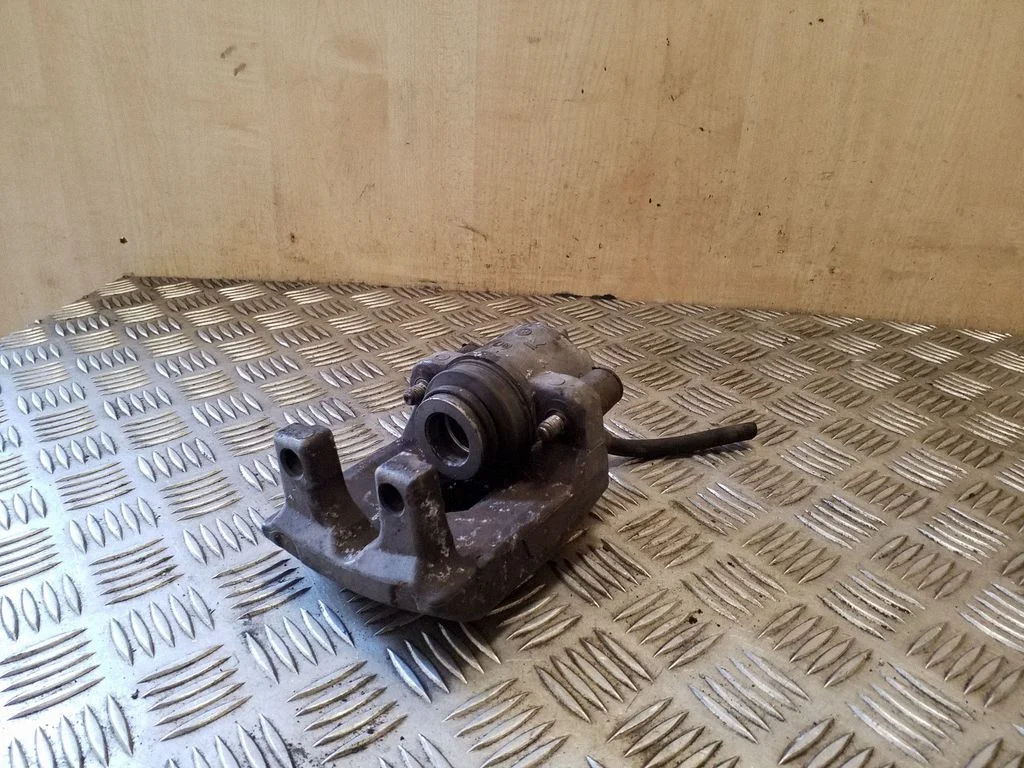 Rear brake caliper – right