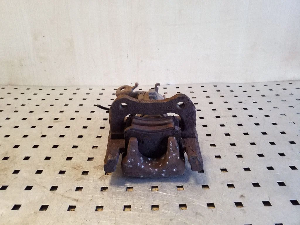 Rear brake caliper – right