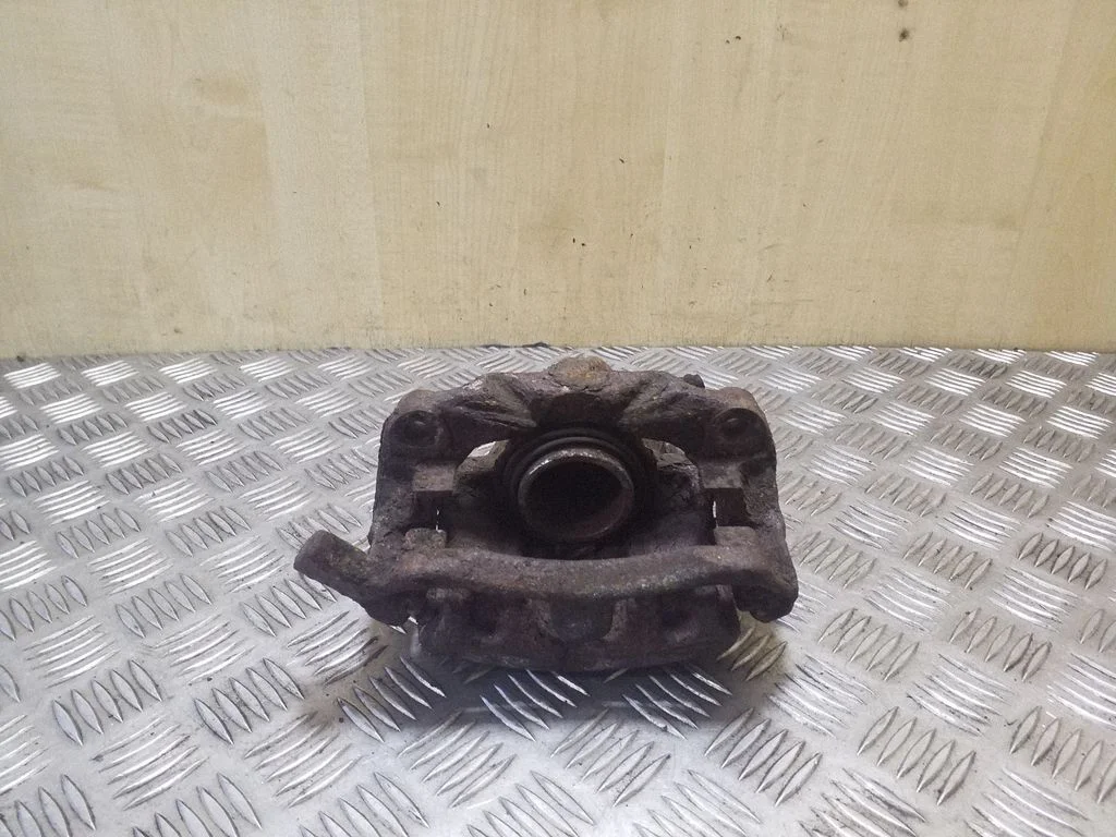 Rear brake caliper – right
