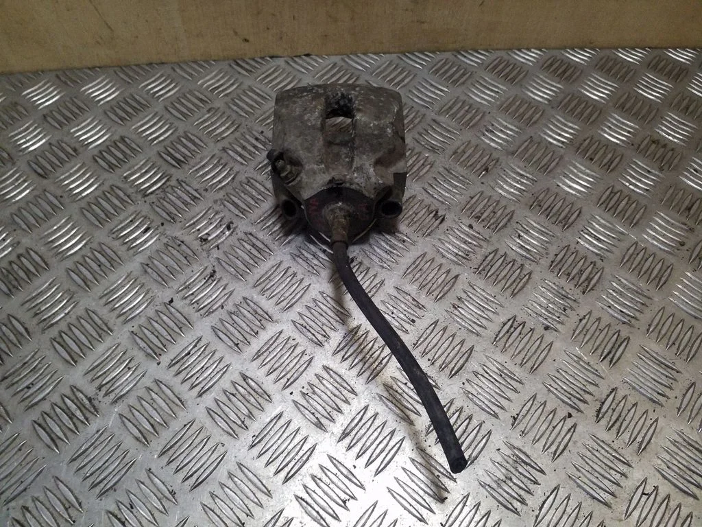 Rear brake caliper – right