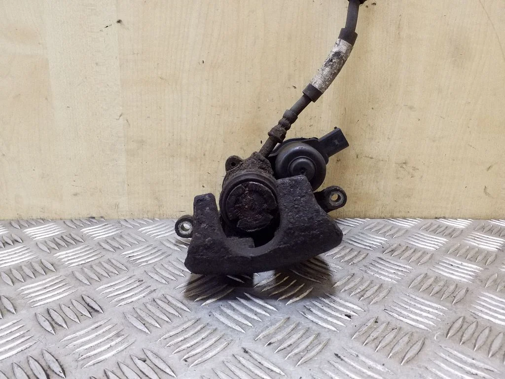 Rear brake caliper – right