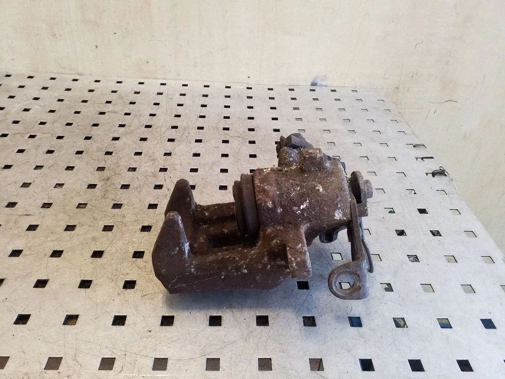 Rear brake caliper – right