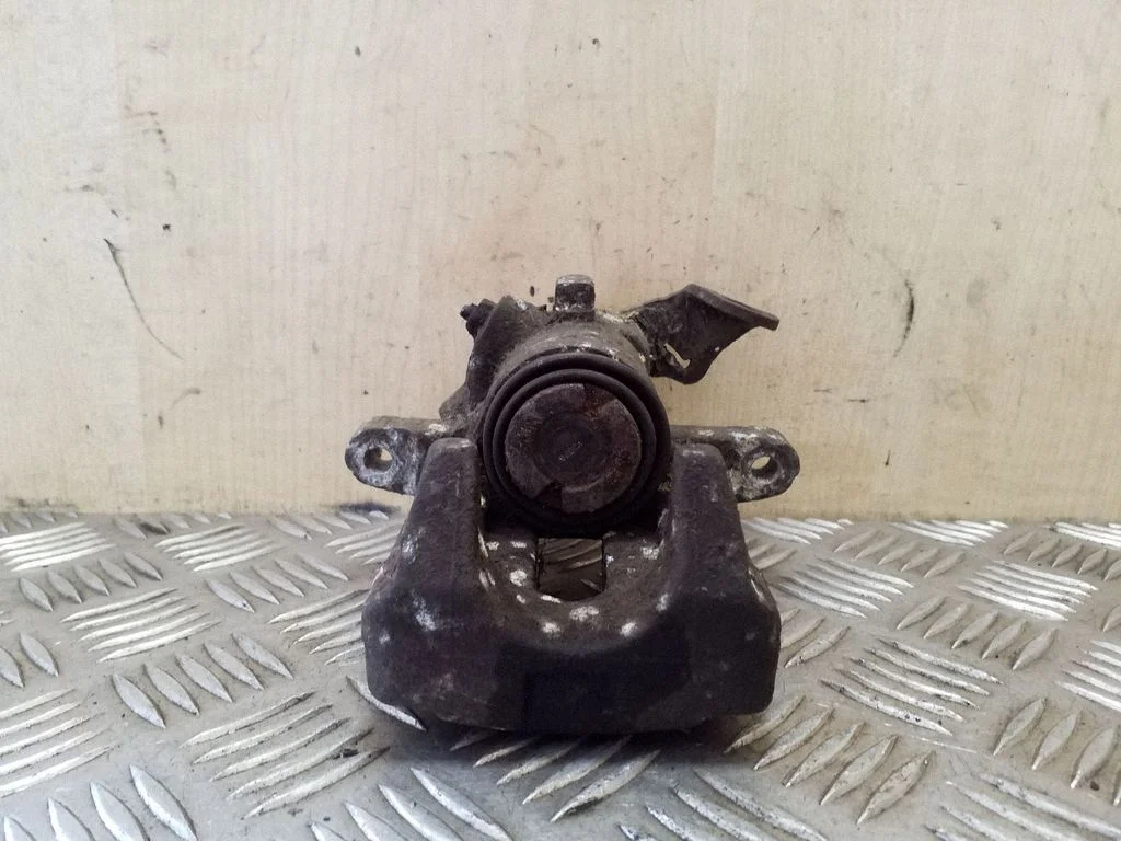 Rear brake caliper – right