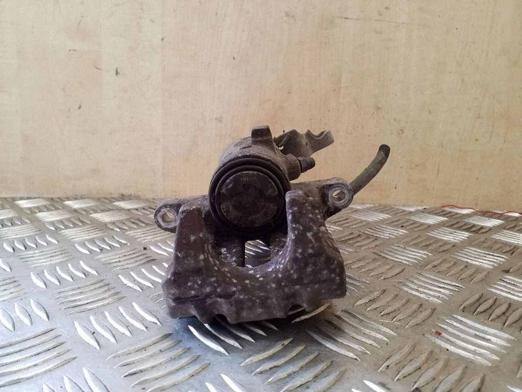 Rear brake caliper – right