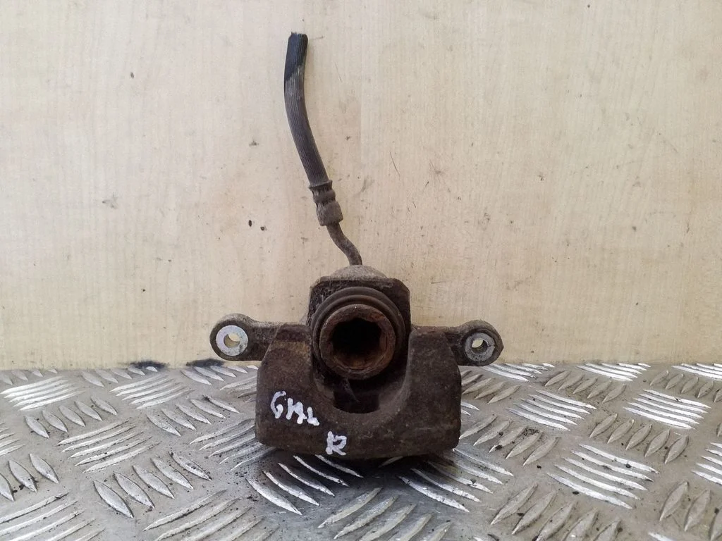 Rear brake caliper – right