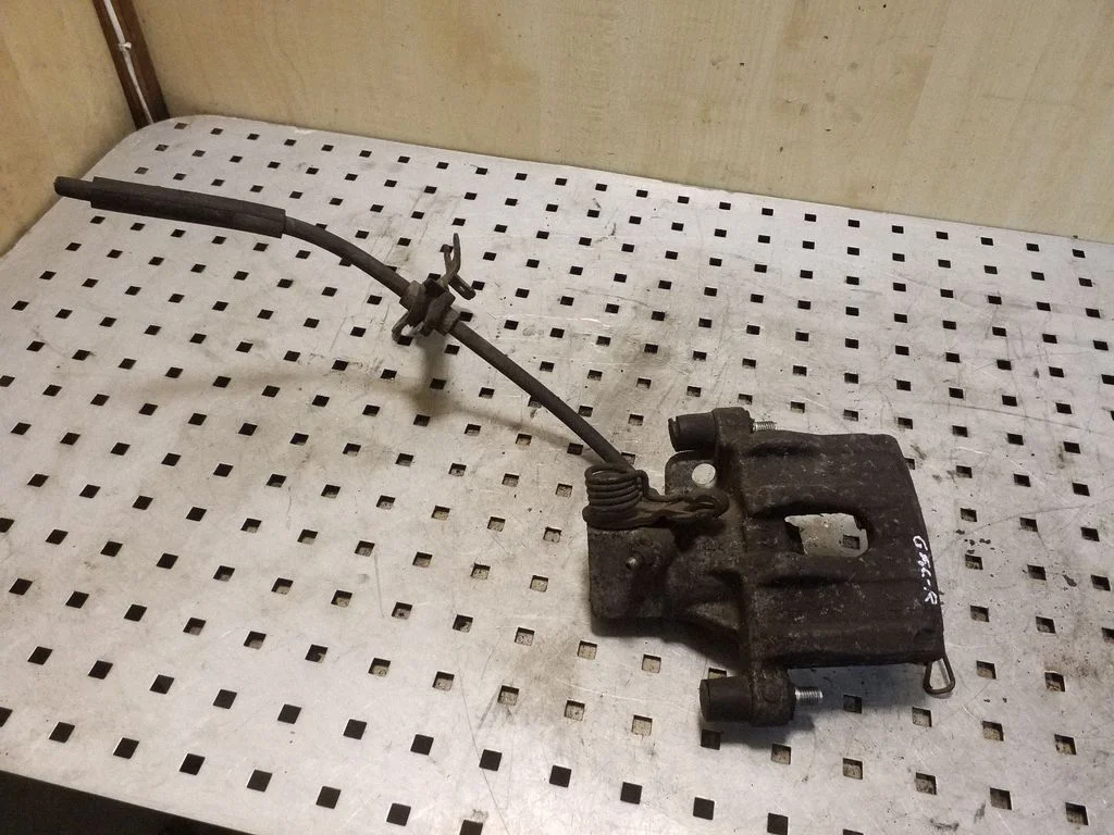 Rear brake caliper – right