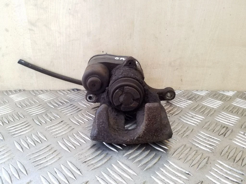 Rear brake caliper 32332594