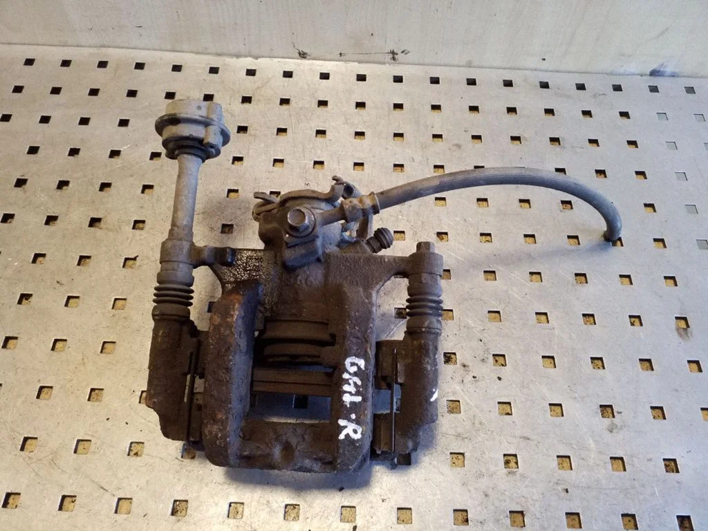 Rear brake caliper – right