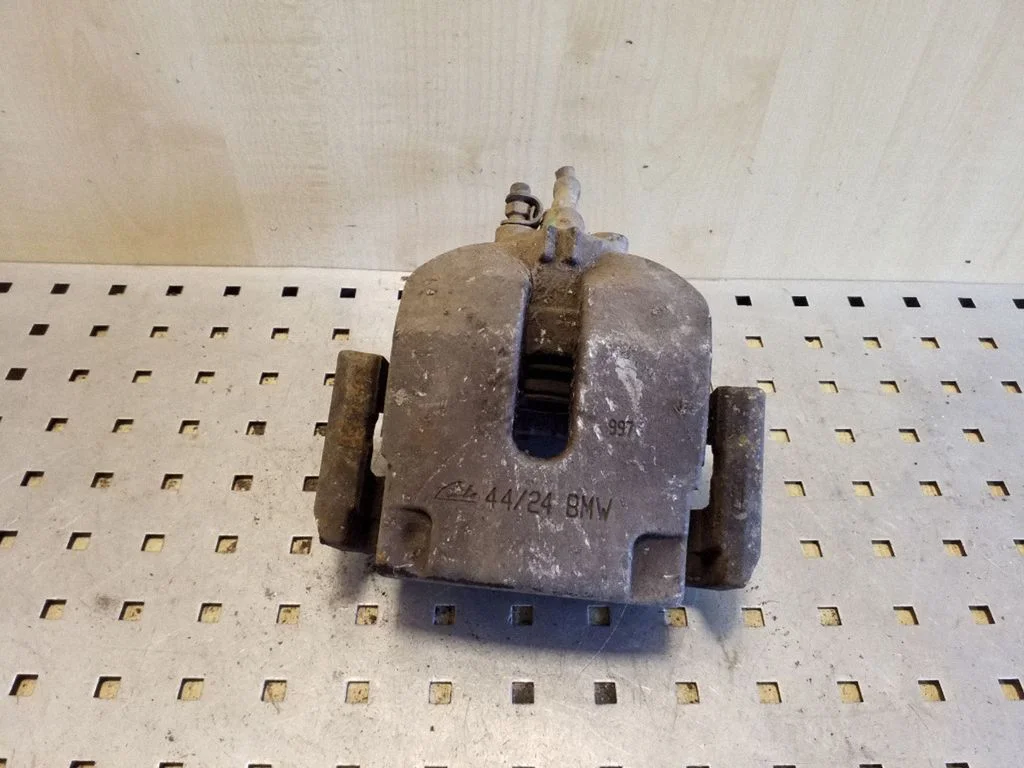 Rear brake caliper – left
