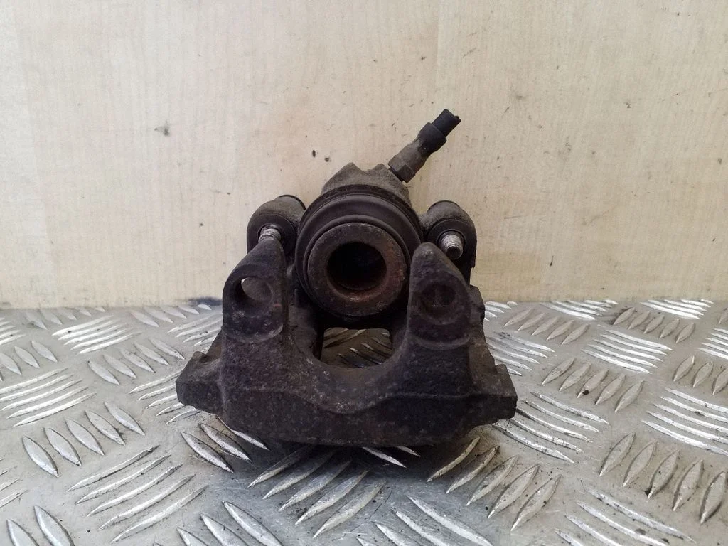 Rear brake caliper – right
