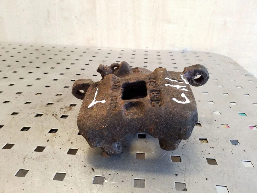 Rear brake caliper – left