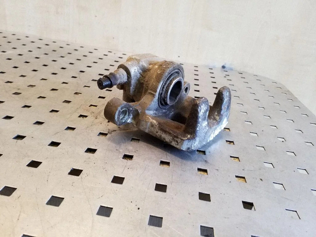Rear brake caliper – right