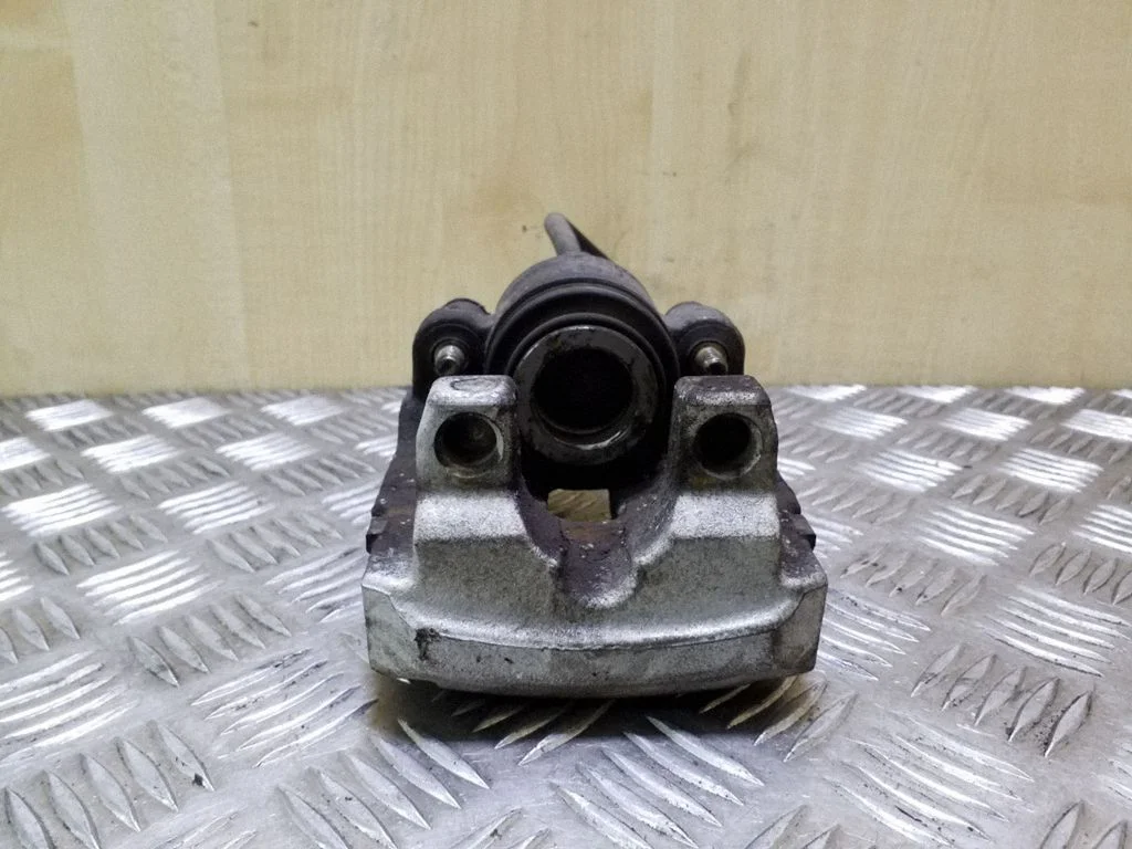 Rear brake caliper – right