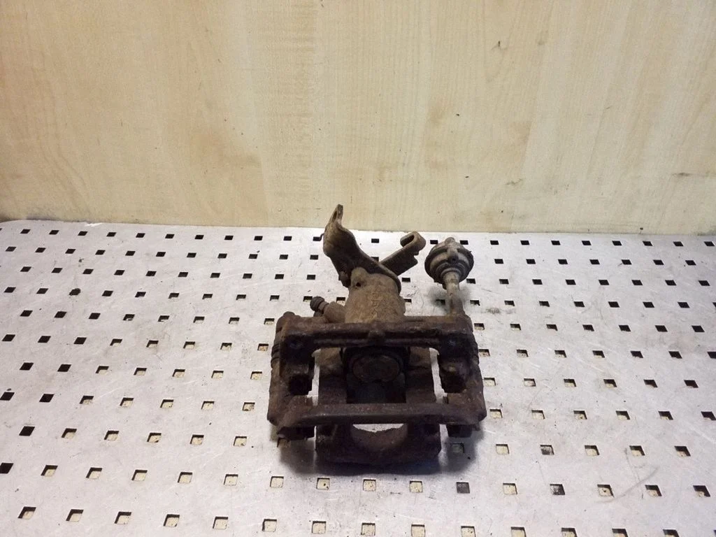 Rear brake caliper – right
