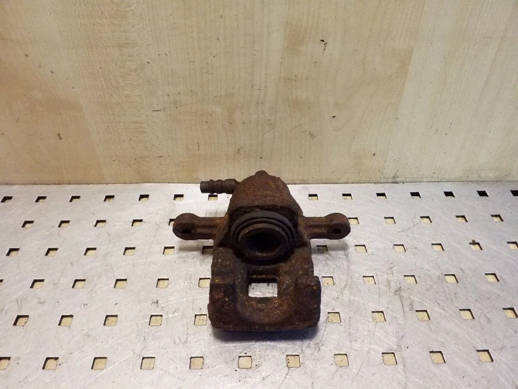 Rear brake caliper – right