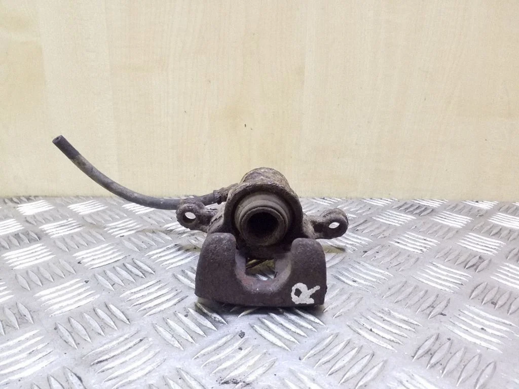 Rear brake caliper – right