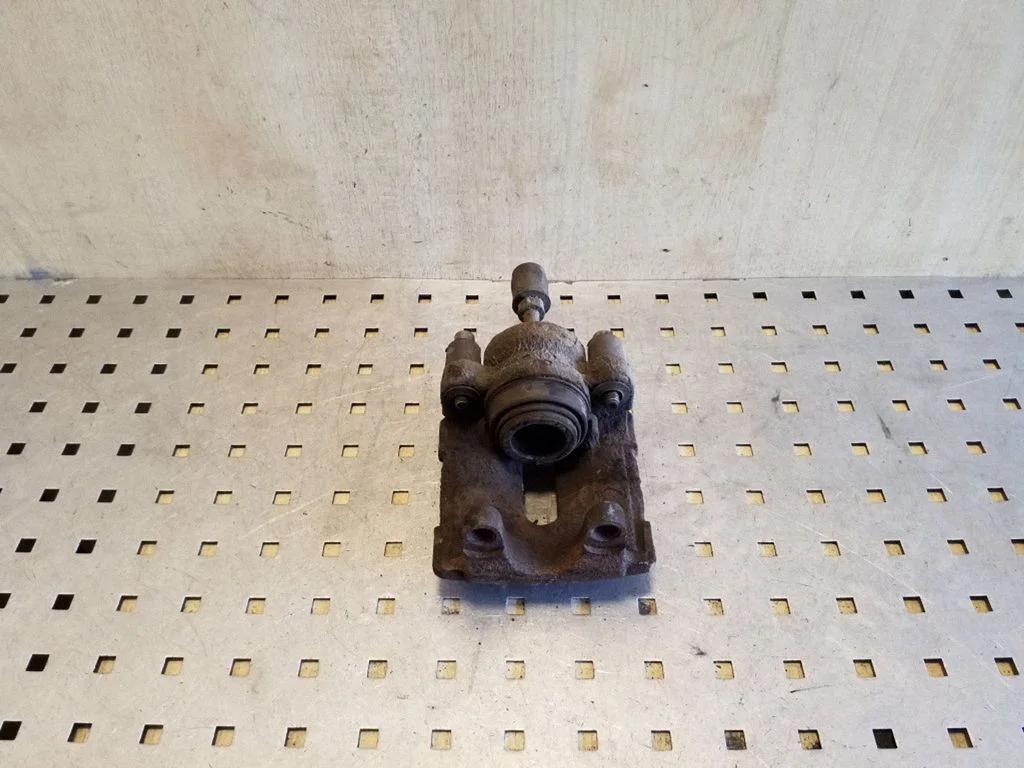 Rear brake caliper – right
