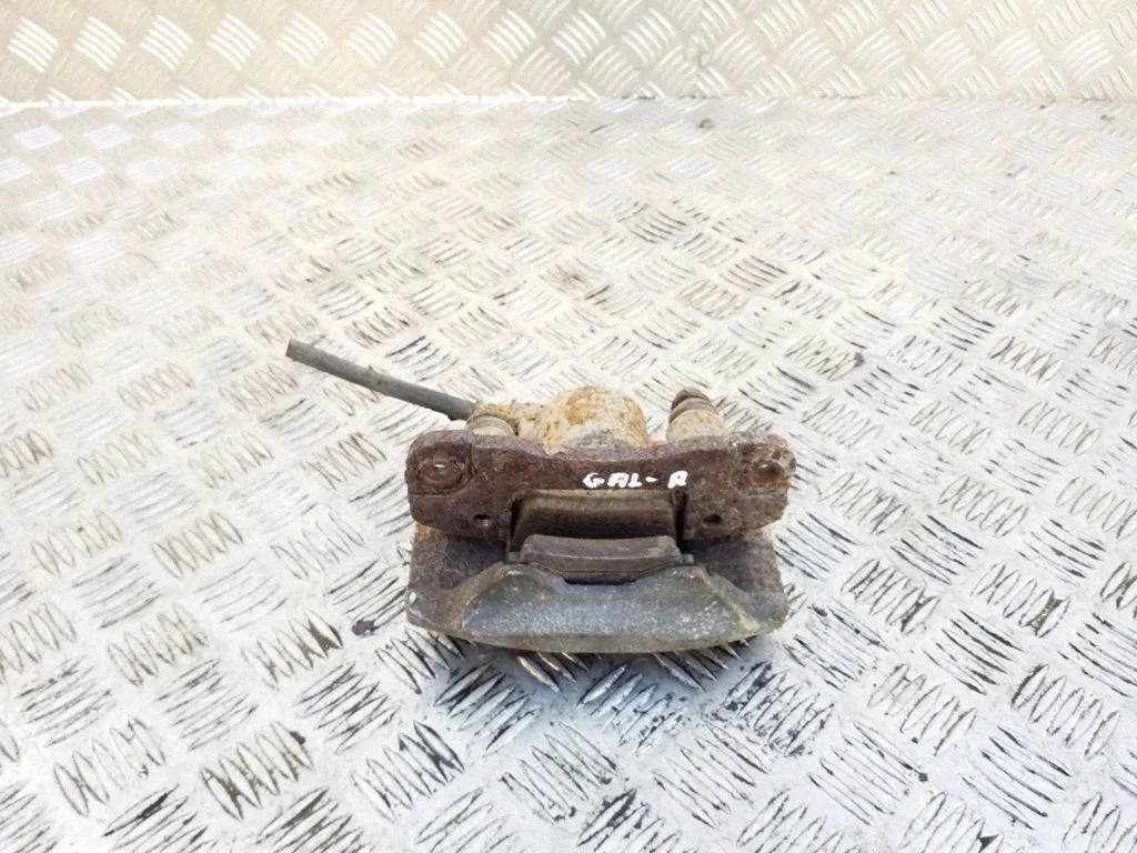Rear brake caliper – right