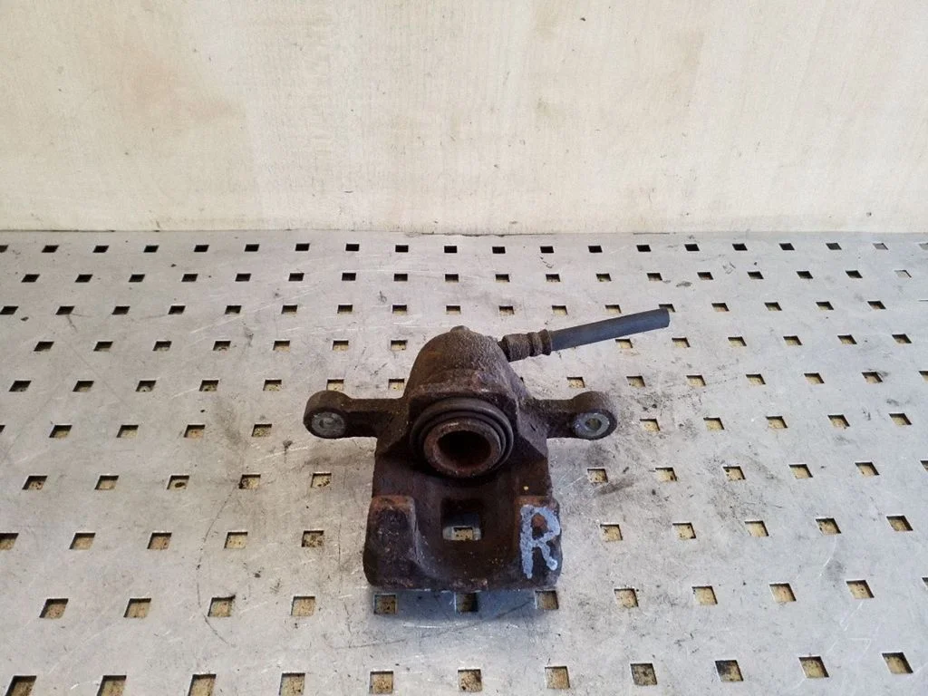 Rear brake caliper – right