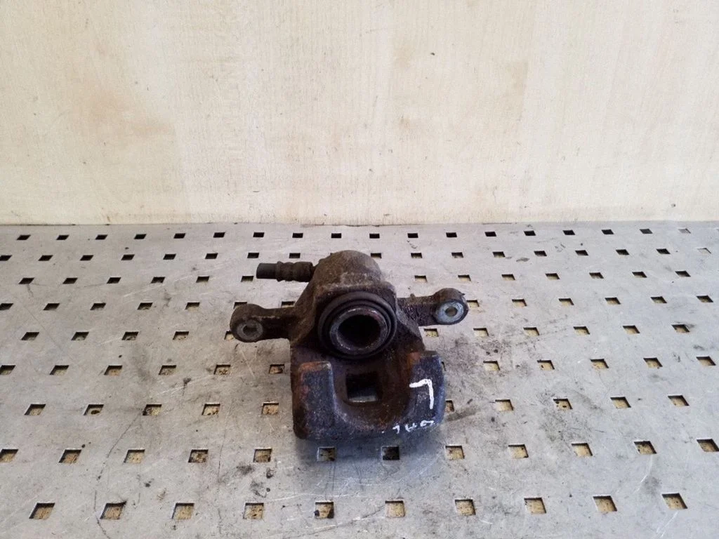 Rear brake caliper – left
