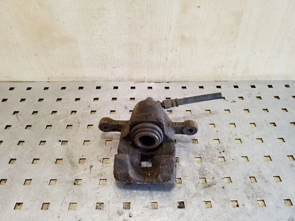Rear brake caliper – right